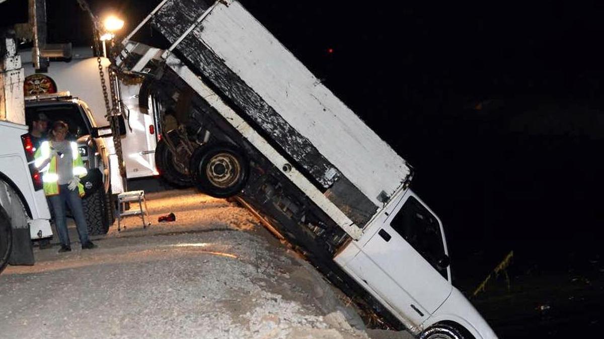 Authorities pull out a truck that was submerged in a canal along the 9500 block of Victory Road in a rural area between Escalon and Oakdale, Calif. on Monday evening (July 25, 2015). Stanislaus County Sheriff’s Officials found Roque Palomino and his wife’s body not far from where the truck was spotted.