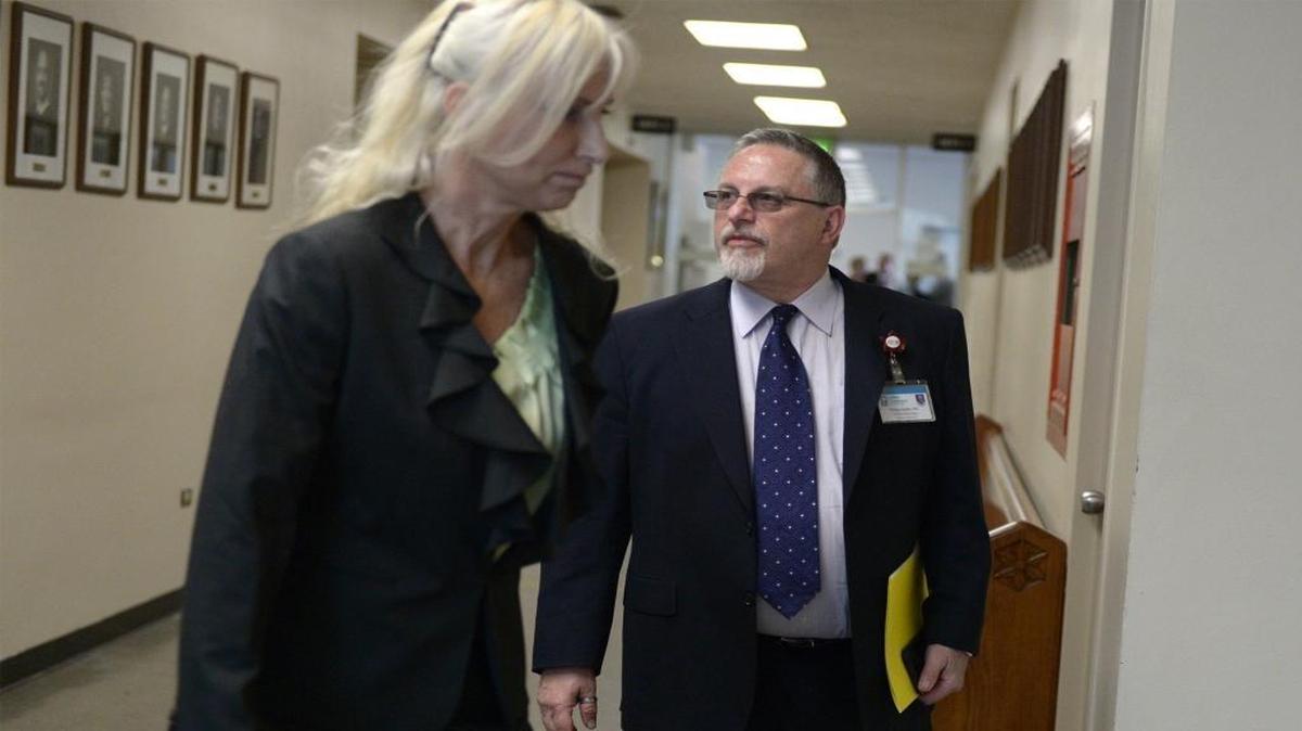 
Phillip Hyden, a child abuse expert with Valley Children’s Hospital in Madera walks into Department 8 of Stanislaus County Superior Court Friday (09-18-15) afternoon in Modesto, Calif. with Chief Deputy District Attorney Annette Rees. Hyden testified in a preliminary hearing for Martin Martinez, who is charged with murder in the death of his girlfriend’s 2 year old son Christopher Ripley.

