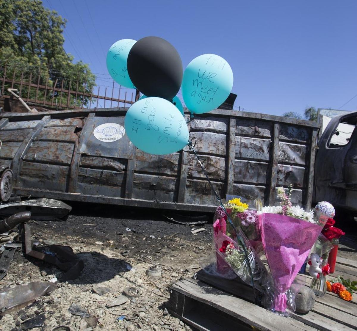 Memorials for Stanislaus County Sheriff’s Department Deputy Jason Garner, 41, and community service officer Raschel Johnson, 42, at the scene of their deaths in a traffic accident Saturday, May14, 2017, morning on Crows Landing Road just south of Seventh Street in Modesto Calif.