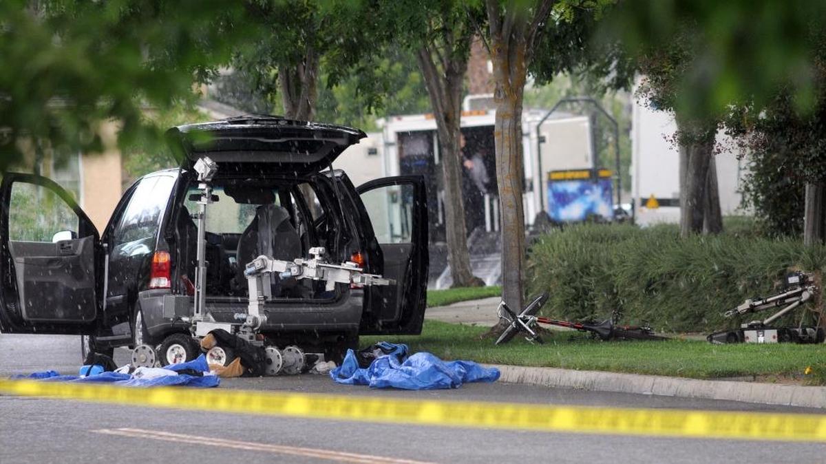 In May of 2012, a remote robot from the Stanislaus County Sheriff’s Department bomb squad probes the back of the minivan used in a robbery at Tri Counties Bank in the Raley’s store at the Village One shopping center.
