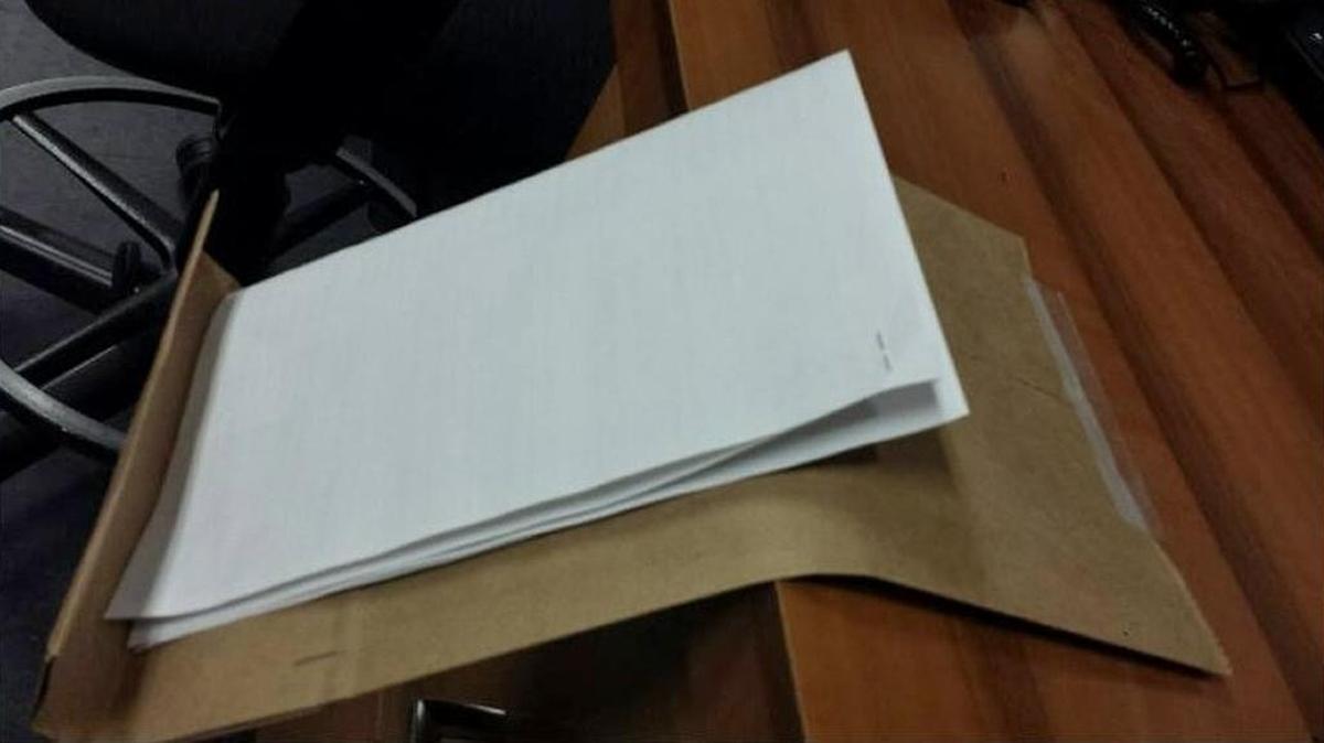 A makeshift mail trap such as this shown on the Turlock Police Department’s Facebook page was found inside a drop box outside the Turlock Post Office on Tuesday night.