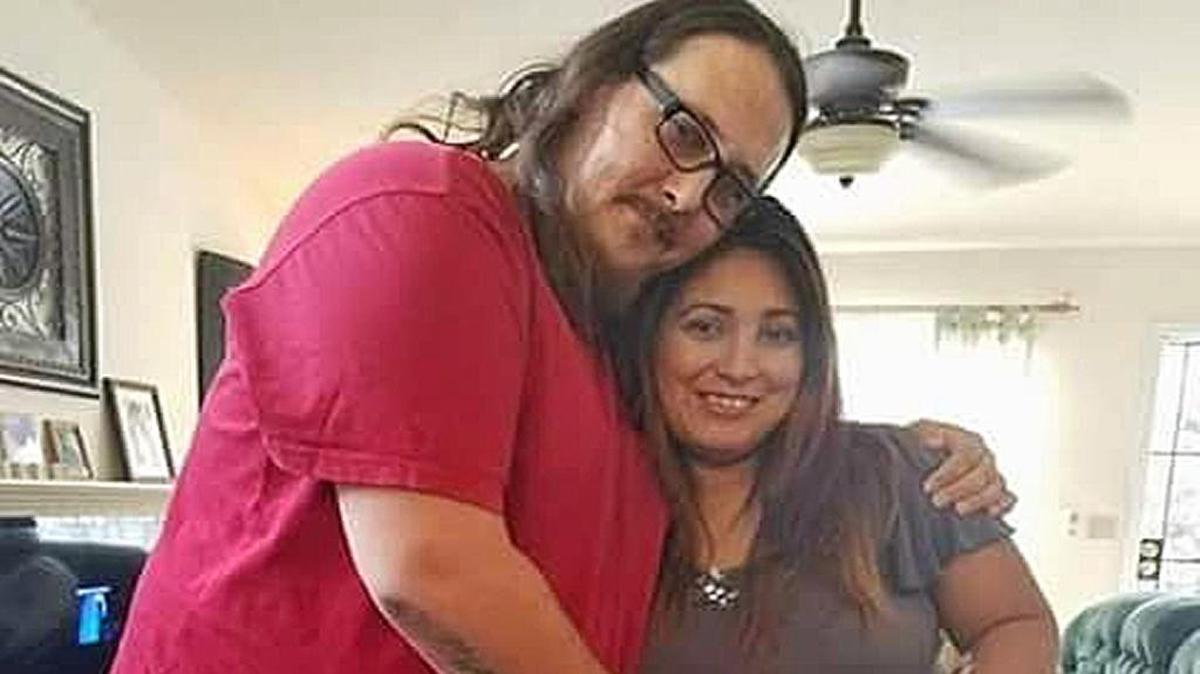 Alex Quintana stands with his girlfriend, Cecelia Dunn.