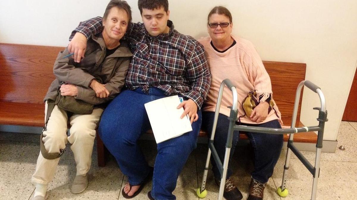 Paul Gordo waits for a court appearance in Monterey County with his aunt Peggy Keirn, left, and mother, Susan Gordo.