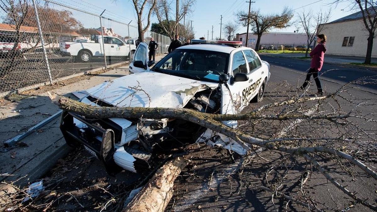 Modesto police officers investigate a crash of a Stanislaus County sheriff’s deputy in Modesto on Sunday.