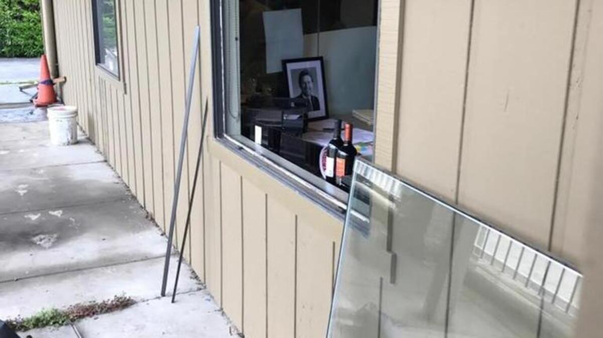 Vandals removed a large glass window at Assemblyman Heath Flora’s Modesto office by cutting around its frame.