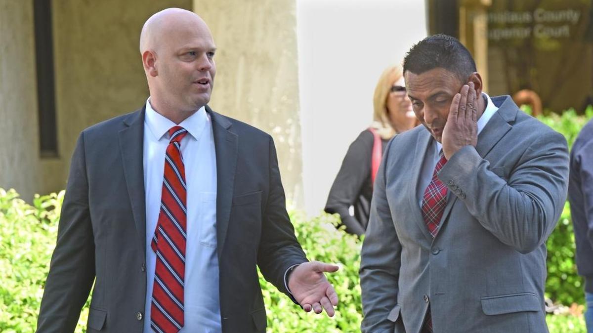 Daljit Atwal leaves court with his attorney Hans Hjertonsson (left) Monday April 10, 2017, after Atwal was ordered to stand trial on a charge of murder in the death of Korey Kauffman.