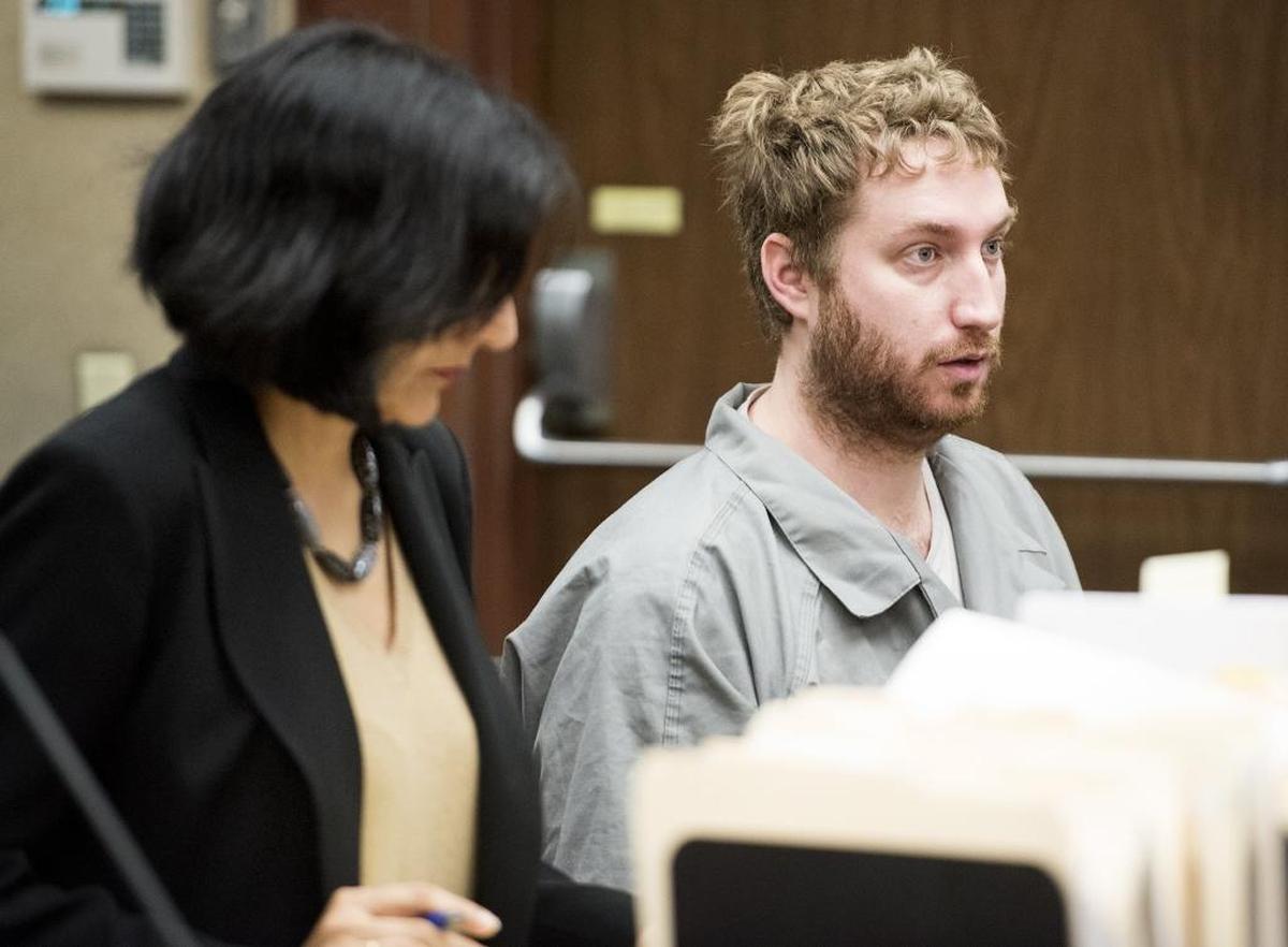 Matthew Nicholson, sitting with Deputy Public Defender Sweena Pannu, speaks with the judge during an arraignment hearing at the Stanislaus County Courthouse in Modesto on Wednesday, Jan. 17, 2018. Nicholson is accused of killing his mother Susanne during an argument.