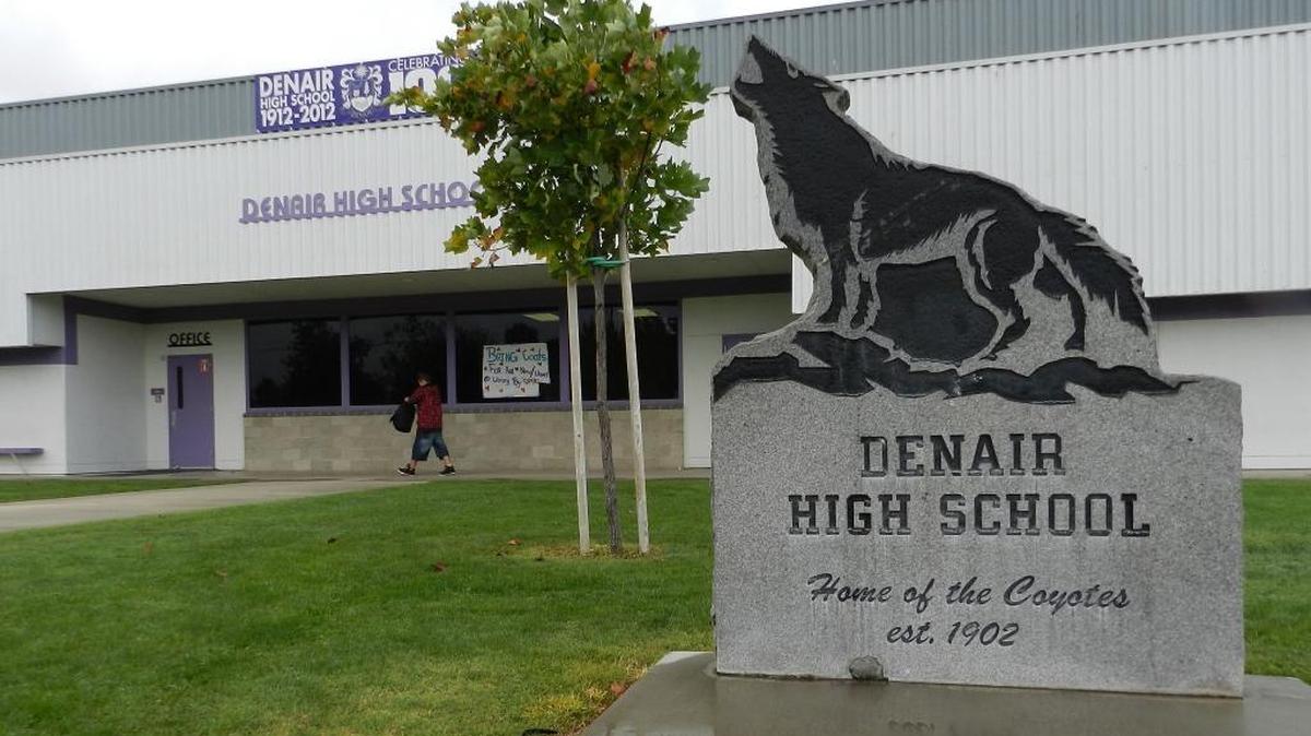 Signs at Denair High’s front office celebrate the district's 100th anniversary in 2012.