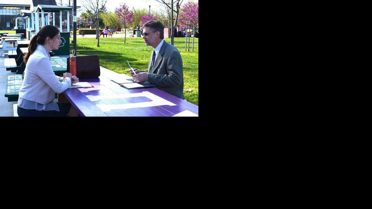 
Kaylee Walker interviews for an English teaching post with Matthew Shipley, head of human resources for the Sylvan Union School District in north Modesto at a teachers fair held March 11, 2015, at California State University, Stanislaus in Turlock, Calif.
