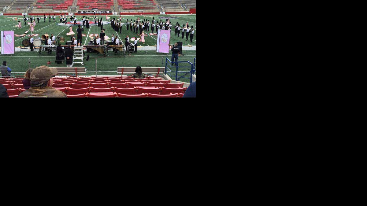 
The Enochs High School Marching Band and Color Guard performs its program, “What If,” at the Western Band Association Grand Championships on Sunday, Nov. 23, 2014, in Bulldog Stadium at California State University, Fresno.

