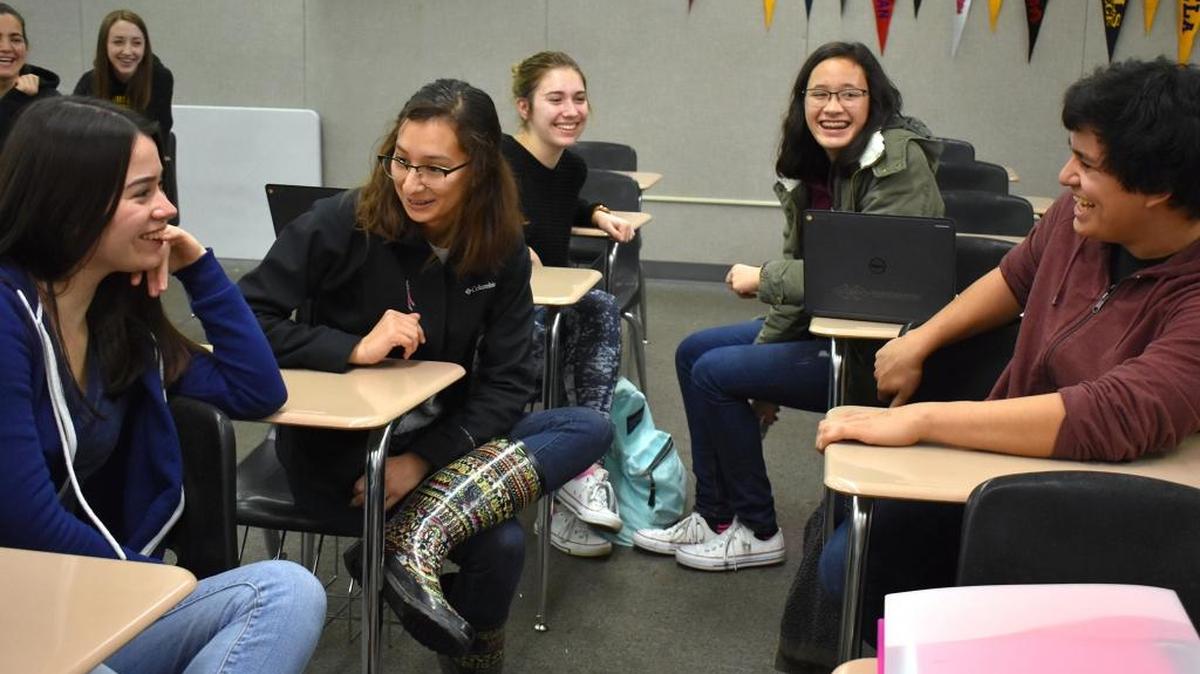 Hughson High team members, clockwise from left, Kristine Piedad, Silvana Contreras, Maddie Hinkle, Maddy Keo and Nick Guzman joke during a group study session getting ready for state competition on Feb. 7, 2017, after winning the Stanislaus County Academic Decathlon, in Hughson.
