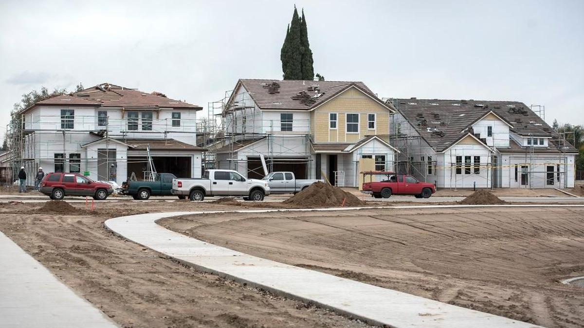 New houses rise on Mable Ave in Modesto, Calif., on Jan. 14, 2016. The shift to new subdivisions is widening economic segregation in the area, a new Stanford study shows.