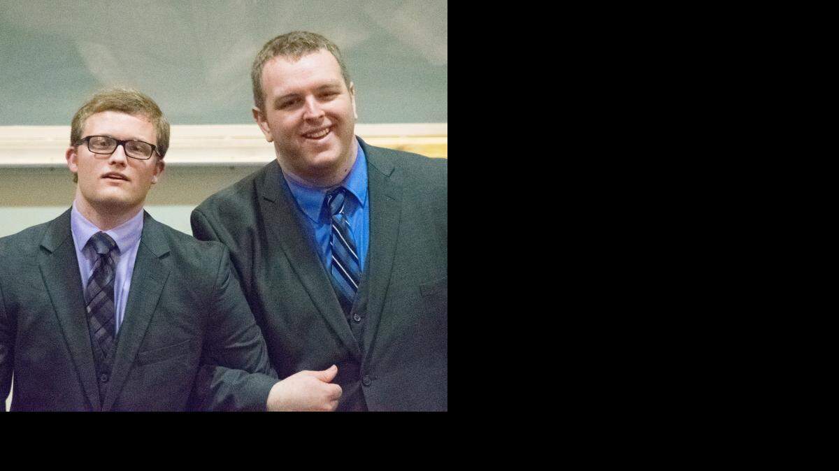 
Modesto Junior College speech and debate team members Jon Sahlman, left, and James Baugh celebrate wins at a December event at UC Berkeley.
