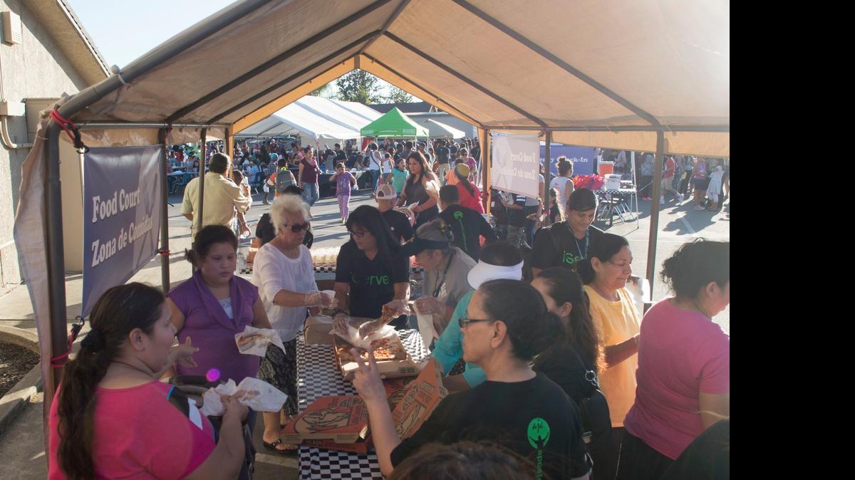 
Pizza is served during the final Family Fun Night of the summer at Apostolic Jubilee Center in Modesto on Friday.
