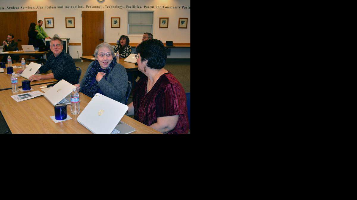 
Ceres Unified School District board members, from left, Mike Welsh, Betty Davis, Valli Wight and, at back table, Teresa Guerrero and Jim Kinard, get a lesson Thursday on Google applications Ceres students will be using when the district checks out laptops to all but its youngest students.
