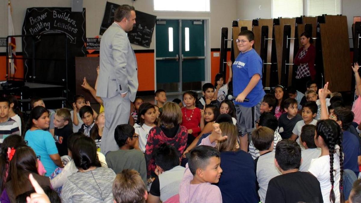 Beaver Elementary, a magnet school for leadership in Ceres, Calif., hosted an assembly for kids to learn about state leadership on Oct. 13, 2016. Here student Christopher Talley asks a question of state Assemblyman Adam Gray.