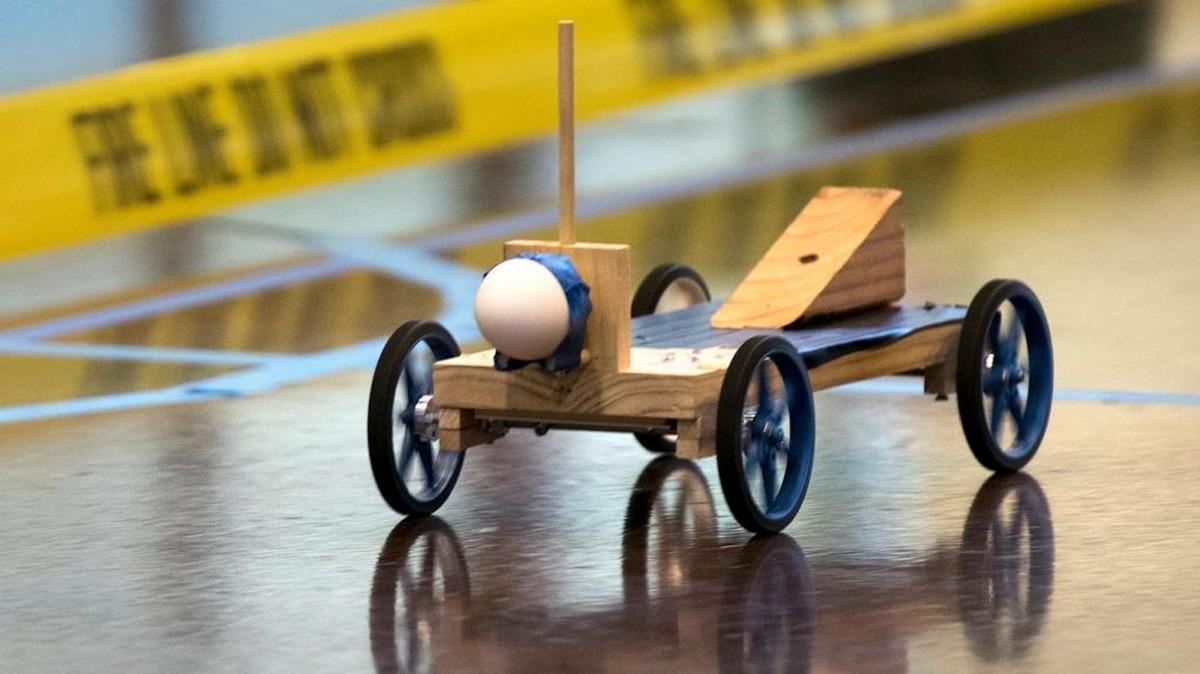 A vehicle made by Modesto High students rolls down a course in the Scrambler competition during the Stanislaus County Regional Science Olympiad in March 2015.