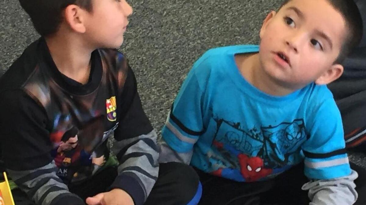 Kindergartners Julian Rodriguez, left, and Jene Baires try to figure out a math problem at Las Palmas Elementary in Patterson, Calif., on March 1, 2016.