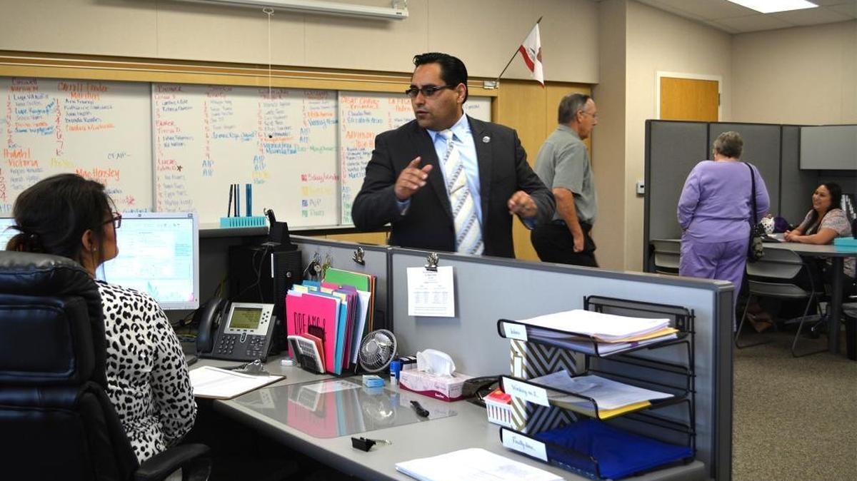 
Robert Serrato leads a school board tour of Walt Hanline School, now housing Ceres Unified School District’s adult school, after school leaders and other programs, but ready to serve as an elementary school when development picks up in Ceres.
