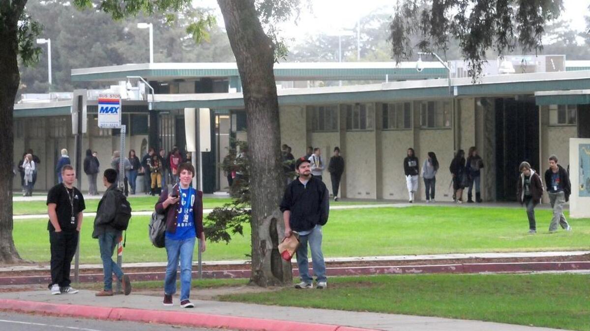 Davis High students leave the campus in this Bee file photo after school in 2012. The older campus experienced a major power outage and shut down early Monday.