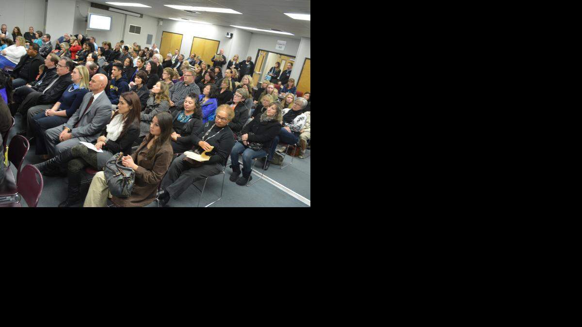 
Every seat was taken, with many standing, for the Modesto City Schools board meeting on Monday, Nov. 17, 2014 in Modesto. Teachers wore black as a protest to what they said was rushed and inflexible implementation of Common Core and new instructional practices, complaining that many more teachers were getting poor evaluations this year.

