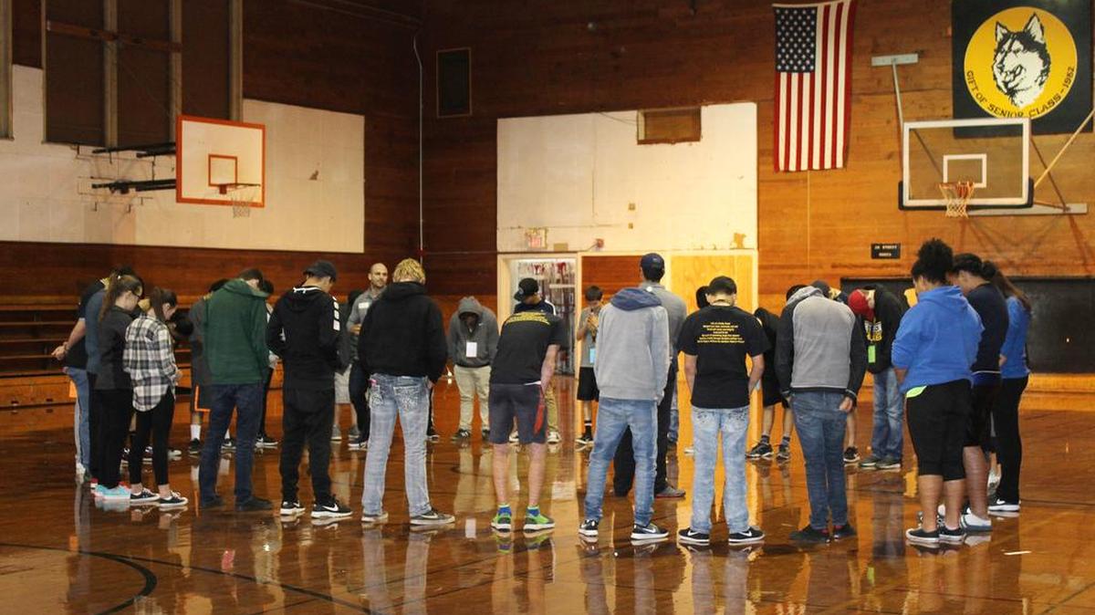 Freshmen take a moment to reflect as part of a workshop on team-building led by former Navy SEALs during the Life of a Husky Conference on Friday at Hughson High School.