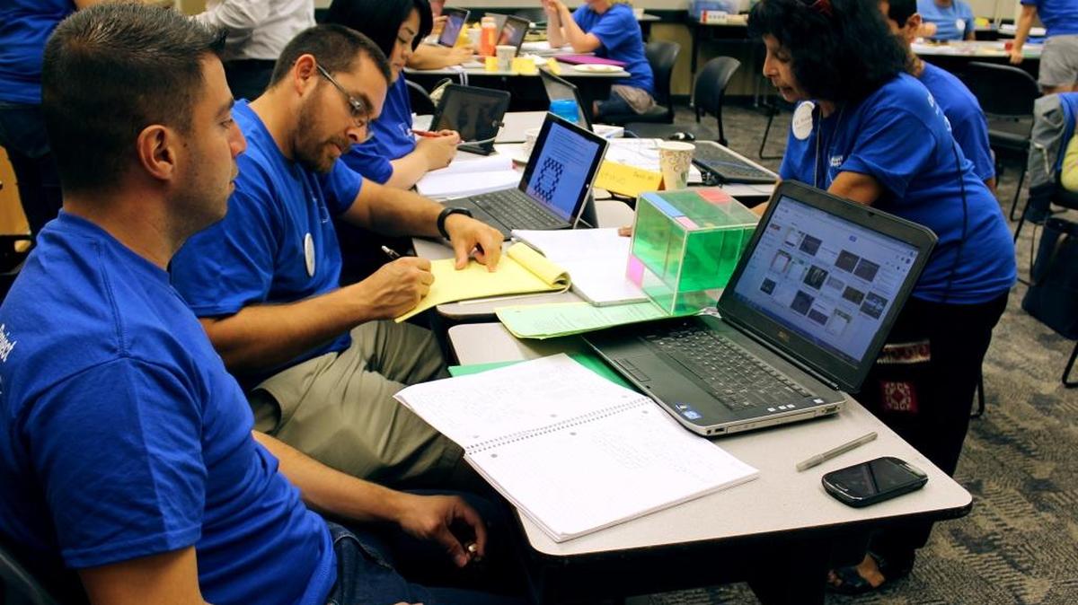California State University, Stanislaus math professor Viji Sundar, right, helps high school math teachers, from left, Enrique Lopez of Orestimba High in Newman, Mark Gonzales of Beyer High and Veronica Chaidez of Johansen High, both in Modesto, work out a series of lesson plans during a weeklong lesson planning retreat in Turlock, Calif., on July 14, 2016.