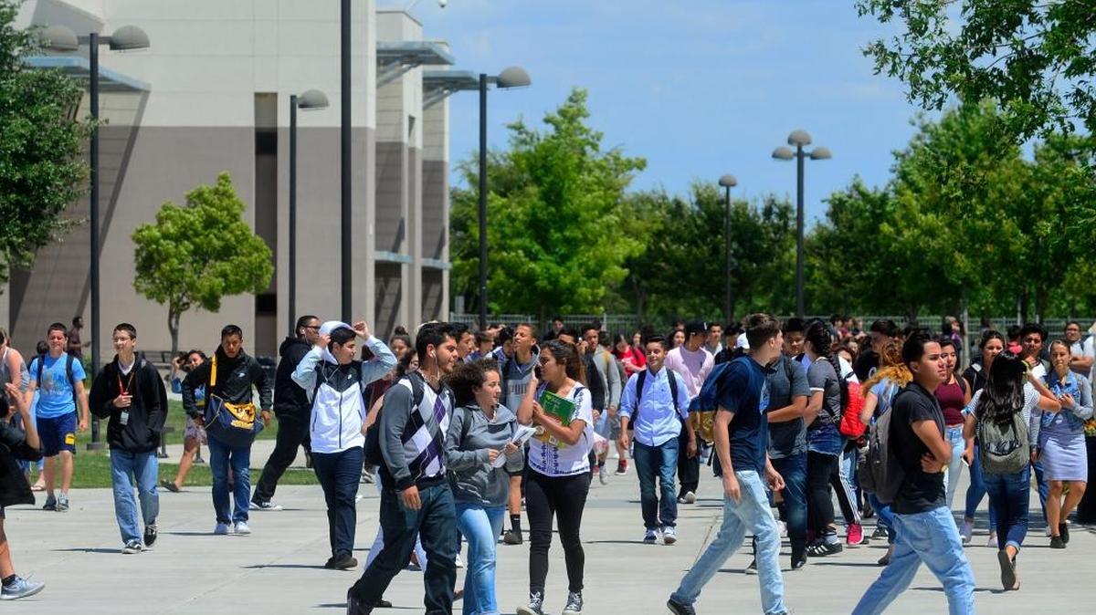 Students walk between buildings at Gregori High School in Modesto on May 20, 2016. Gregori High had the highest graduation rate among Modesto high schools.