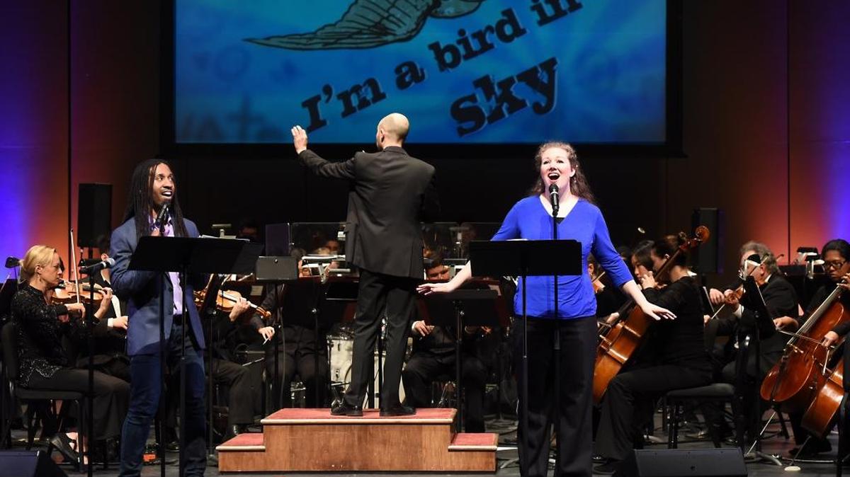 Omari Tau, left, and Liisa Davila perform Friday morning, March 11, 2016, with The Modesto Symphony Orchestra at the Gallo Center for the Arts in downtown Modesto, Calif. The concert’s aim was to provide platforms for students to show what they had learned through the Link Up program.