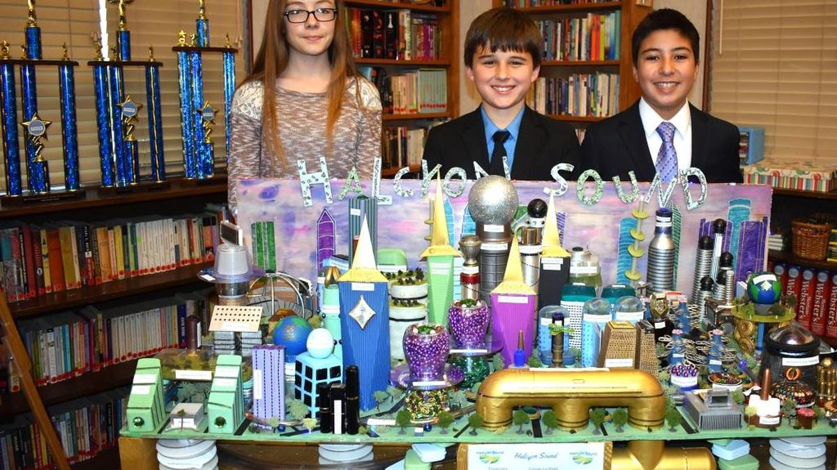 From left, presenters Natalie Caulkins, Conner LaRosa and Evan Johns will represent Rexann Casteel’s seventh-grade class team as Northern California champions at the national Future City competition in Washington, D.C. The students are pictured at Gratton School in Denair.