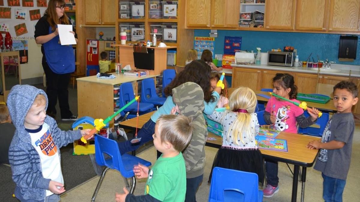 Children play before lunch at First United Methodist Church’s Tiny Tots program on April 15, 2016, in Modesto, Calif. The preschool is celebrating its 50th anniversary this year.