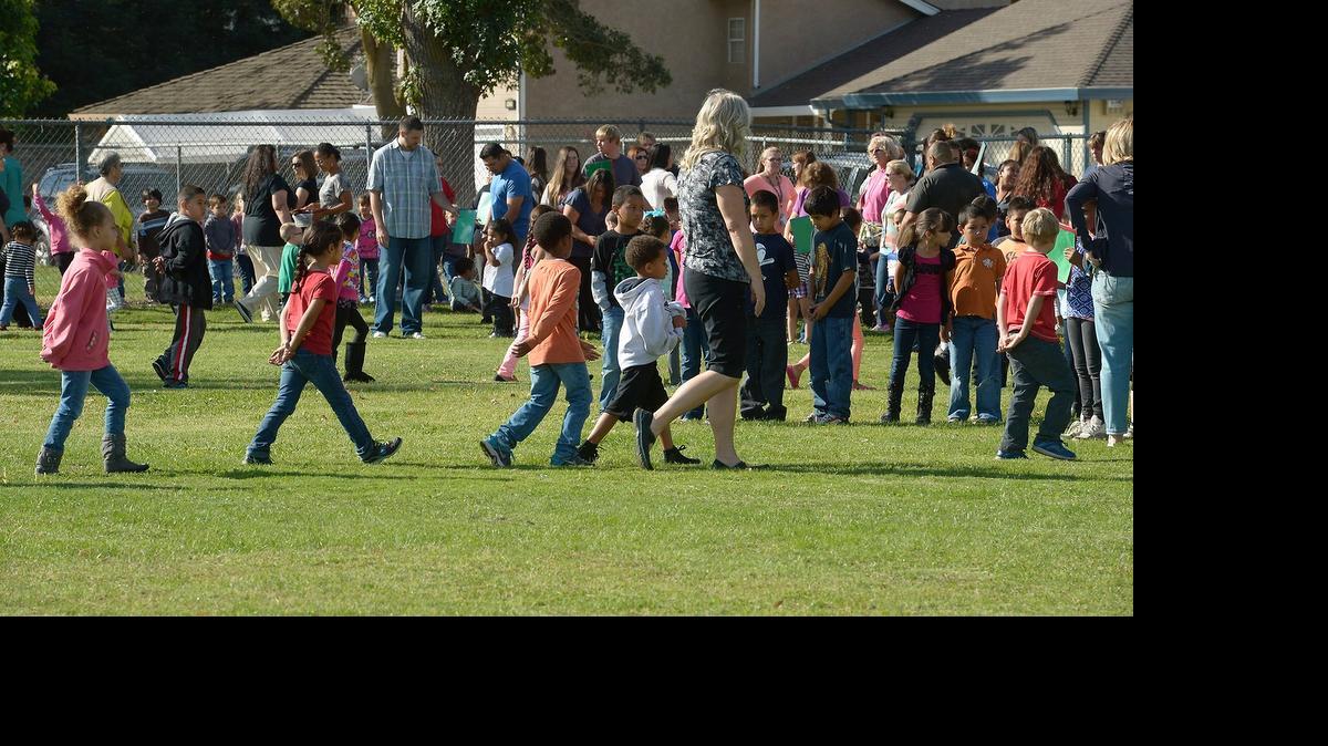 
Garrison Elementary School teachers and students participate in a fire drill in October. The school is one of five piloting a city of Modesto and Modesto City Schools joint project to create safer neighborhoods.
