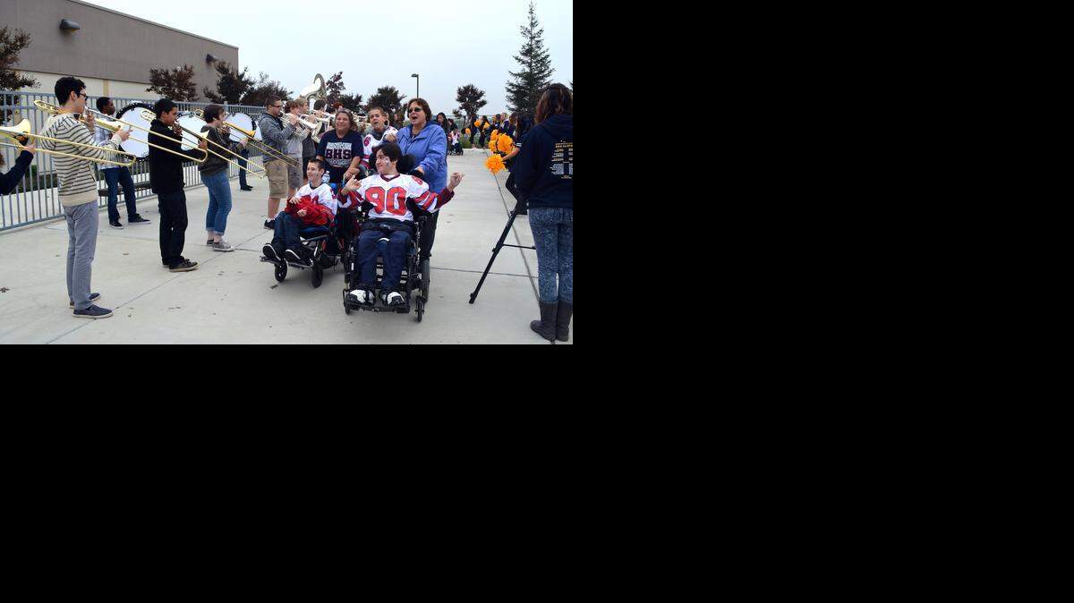
Beyer High School students with disabilities arrive for the Challenged Athletics meet, a Modesto Metro Conference event with band and cheerleader welcome at Gregori High in Modesto on Thursday.
