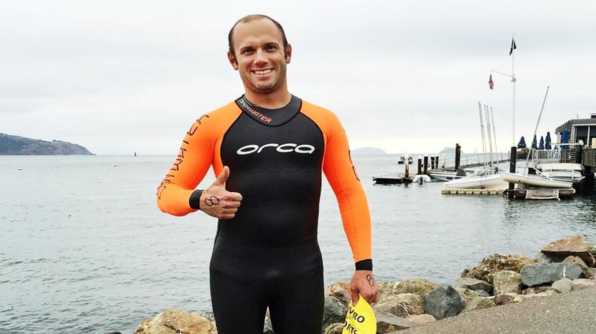 Dr. Jacob Barber recovers after completing the 1.6-mile Golden Gate Shark Fest in San Francisco in September. Barber swam to raise almost $2,000 for the Stanislaus Reads campaign.