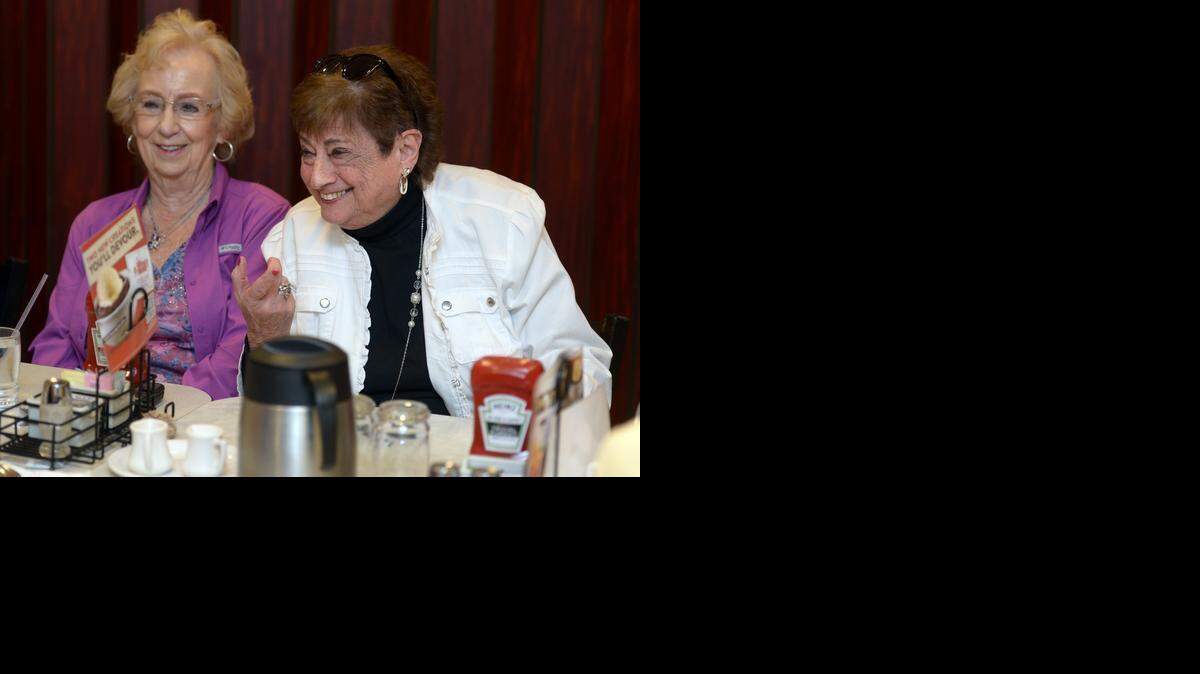 
Ann Burkett, right, enjoys herself recently  at a Traveleers Club meeting at Denny's in Modesto. With her is Mary Hobbs of Ripon.
