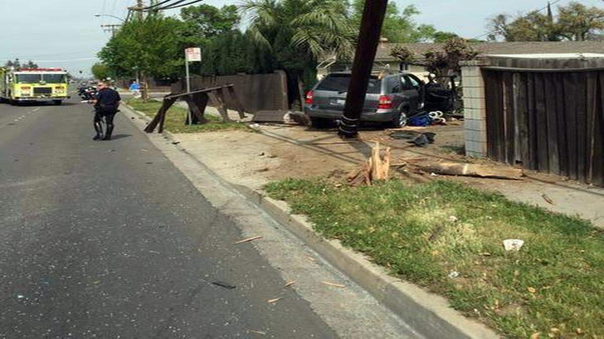 
First responders are seen at the scene of a two-vehicle crash near a Burger King on Oakdale Road in Modesto on Friday that left a pedestrian with major injuries.
