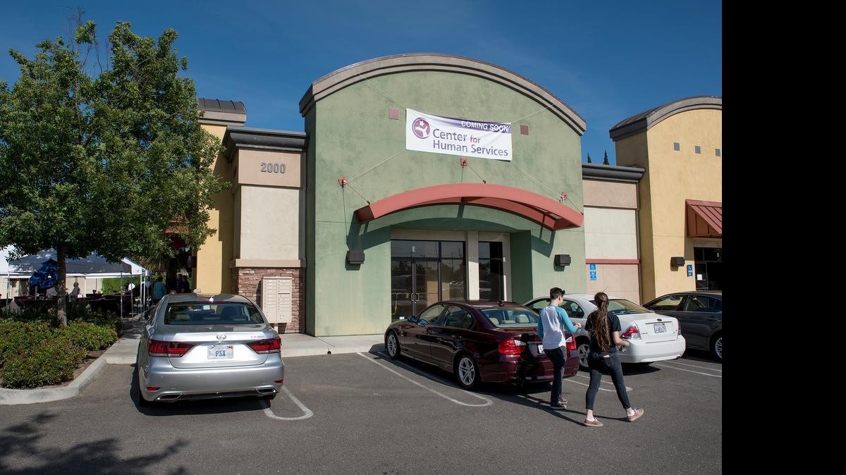 
Guests take a tour of the Center for Human Services’ new building on Briggsmore Avenue in Modesto on Tuesday.
