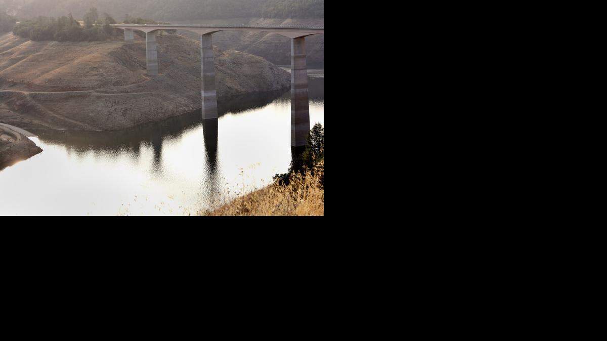 
The water level at New Melones reservoir on the Stanislaus River continues to drop, as evidenced by the exposure of the piers of the Stevenot Bridge on Highway 49.
