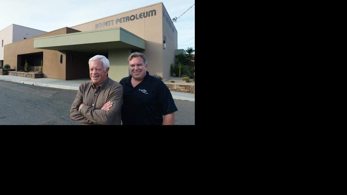 
Boyett Petroleum CEO Carl Boyett, left, and son Dale Boyett, company president, stand outside their headquarters on McHenry Avenue in Modesto on Monday. Family-owned Boyett Petroleum has expanded its operations.
