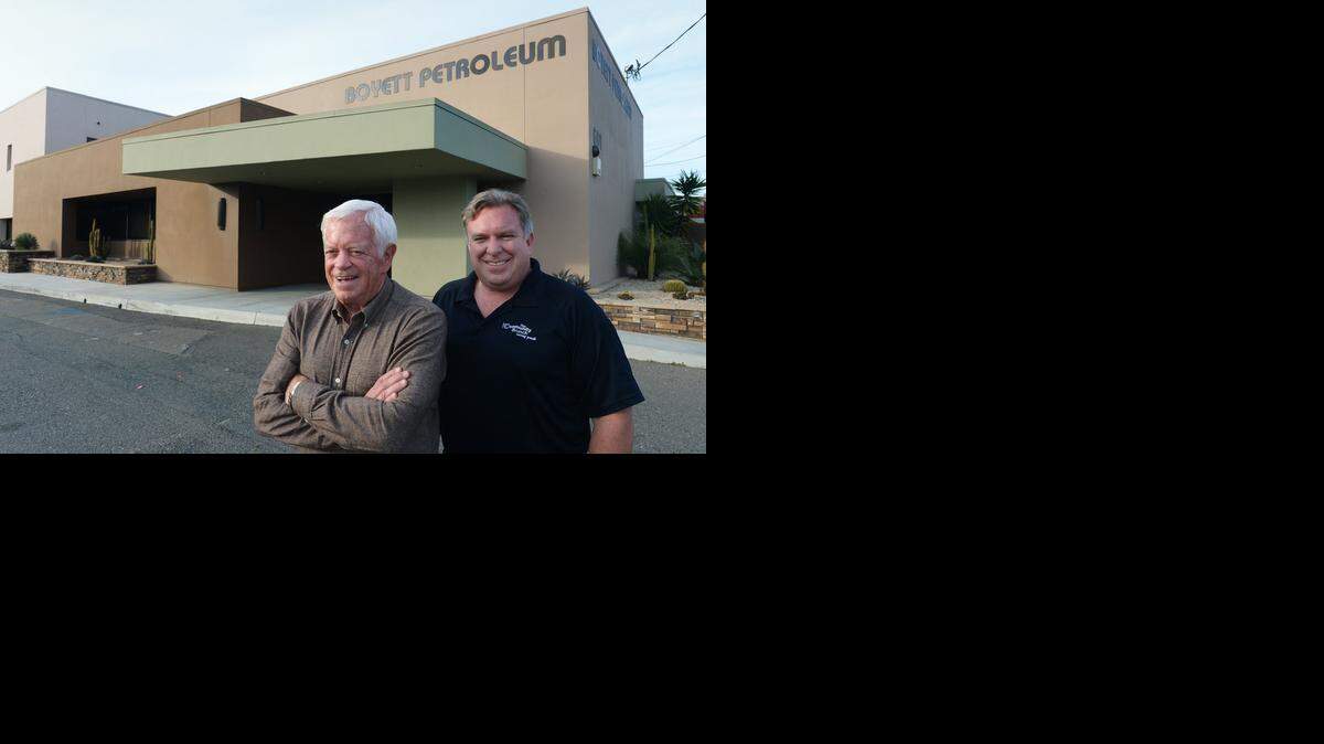 
Boyett Petroleum CEO Carl Boyett, left, and son Dale Boyett, company president, stand outside their headquarters on McHenry Avenue in Modesto on Monday. Family-owned Boyett Petroleum has expanded its operations.
