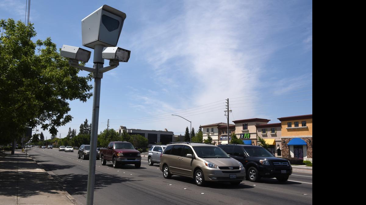 
A red-light camera at Oakdale Road near Briggsmore Avenue in Modesto is one of the systems the city has at four major intersections. 
