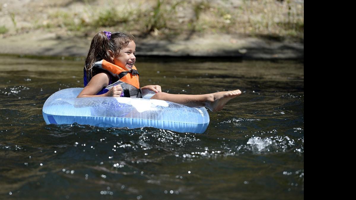 
Dani Azpeitia, 7, of Riverbank floats down the Stanislaus River at Horseshoe Road Recreation Area in Oakdale on Sunday.
