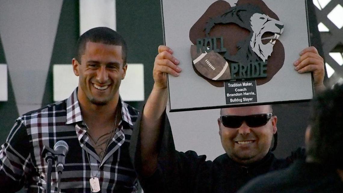 San Francisco 49ers quarterback Colin Kaepernick, a Pitman High School graduate, with his high school coach Brandon Harris, May 30, 2013.