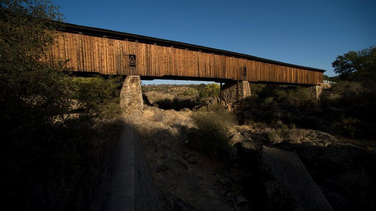 At 330 feet long, the Knights Ferry Covered Bridge spanning the Stanislaus River at the Knights Ferry Recreation area is the longest covered bridge west of the Mississippi River.