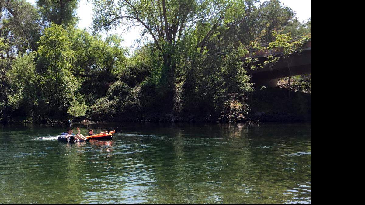 
Rafters, tubers and swimmers enjoy the cold water of the Stanislaus River on a warm afternoon Sunday  at the Knights Ferry Recreation Area east of Oakdale.
