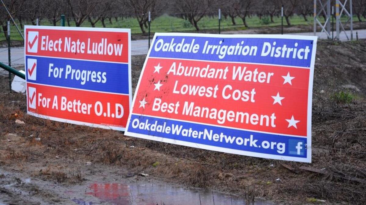 Campaign signs for Nate Ludlow, who is running to fill the seat available if Oakdale Irrigation District board member Linda Santos is recalled in a special April 25 election, are posted next to signs from OakdaleWaterNetwork.org, which supports OID General Manager Steve Knell and the way he runs the district. These signs are posted at Claribel Road and the Oakdale-Waterford Highway, southeast of Oakdale.