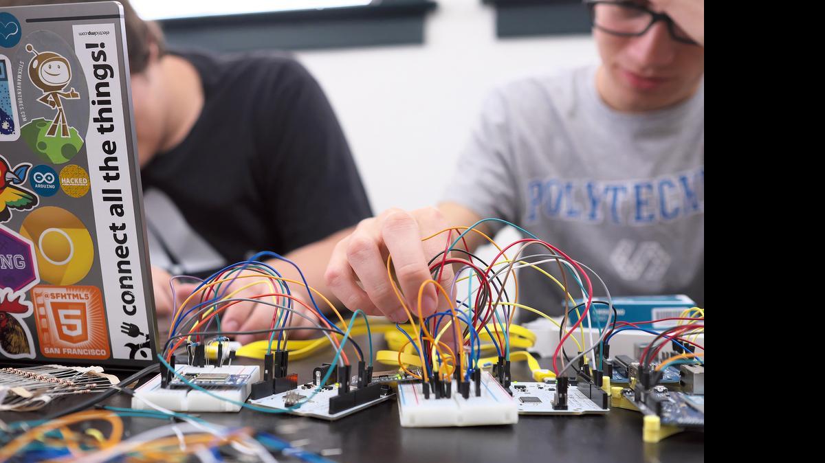 
Kevin Monk, left, and Mario Muniz of Stickman Ventures in Oakdale assemble sensors that will be part of a demonstration at Thursday’s launch of the Oakdale Innovation Center. Stickman is one of several partners in the center, which will provide startup businesses with mentoring, technical services, access to investors and other services.
