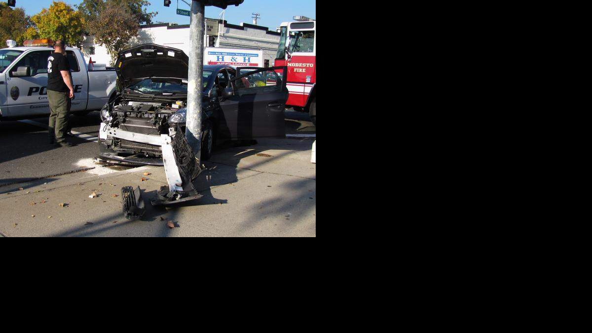 
A car ran a red light and crashed into a Modesto City Schools bus carrying 59 high school students in downtown Modesto on Tuesday afternoon, authorities said.
