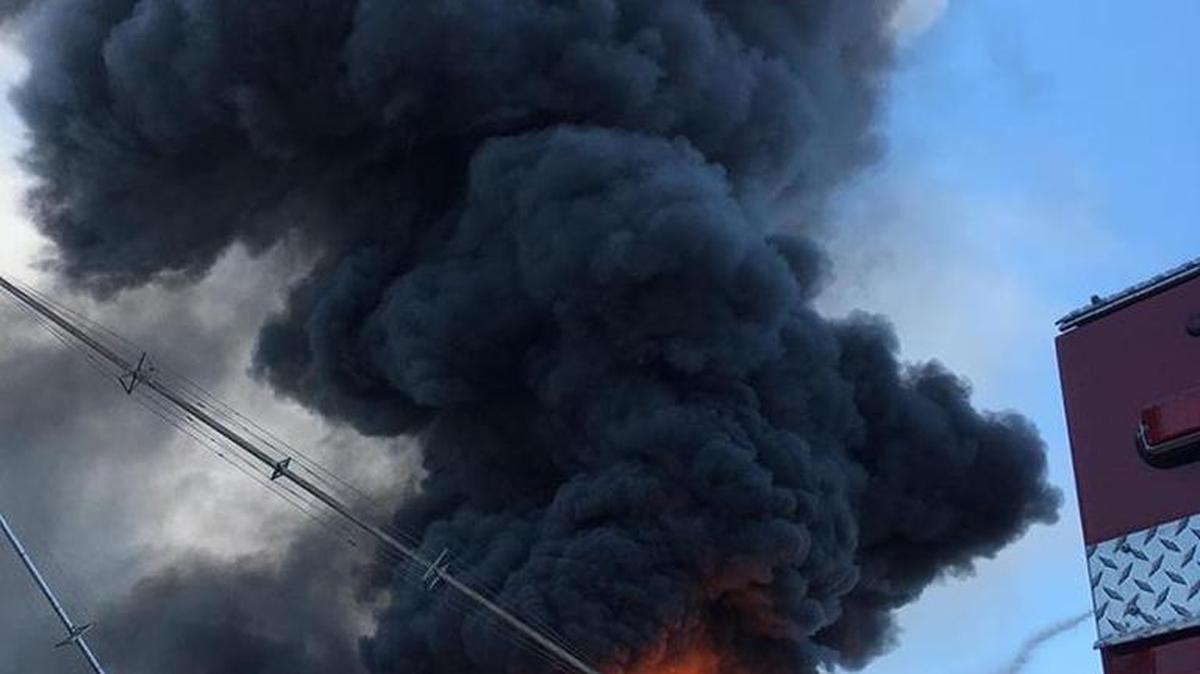 Fire at a French Camp, California grain pressing facility just east of Interstate 5 Sunday morning (July 9, 2017) A thick column of black smoke visible from as far as Modesto.