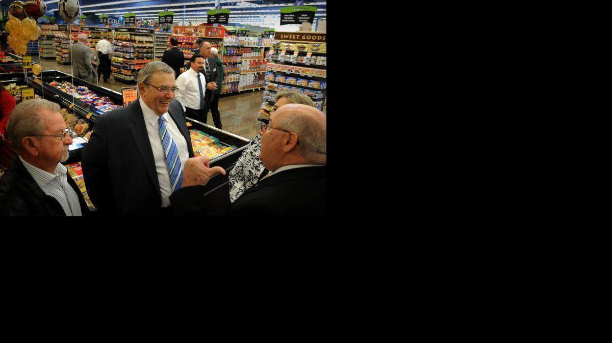 
Bob Piccinini, CEO Save Mart, at the new Save Mart store opening on Pelandale Road at Chapman in Modesto in 2010. Arvin Schok, left, and Cecil Russell talk to Piccinini. 
